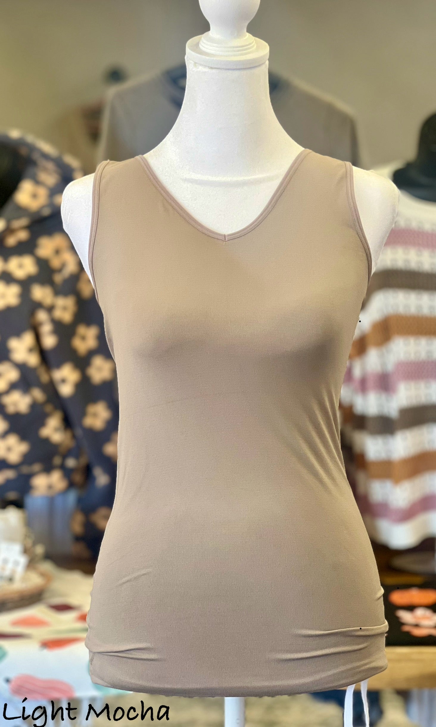 Reversible Sculpt & Polish Tank Top showcasing innovative shaping technology. Versatile design with options for scoop or v-neck. Ideal for a confident and elegant silhouette.