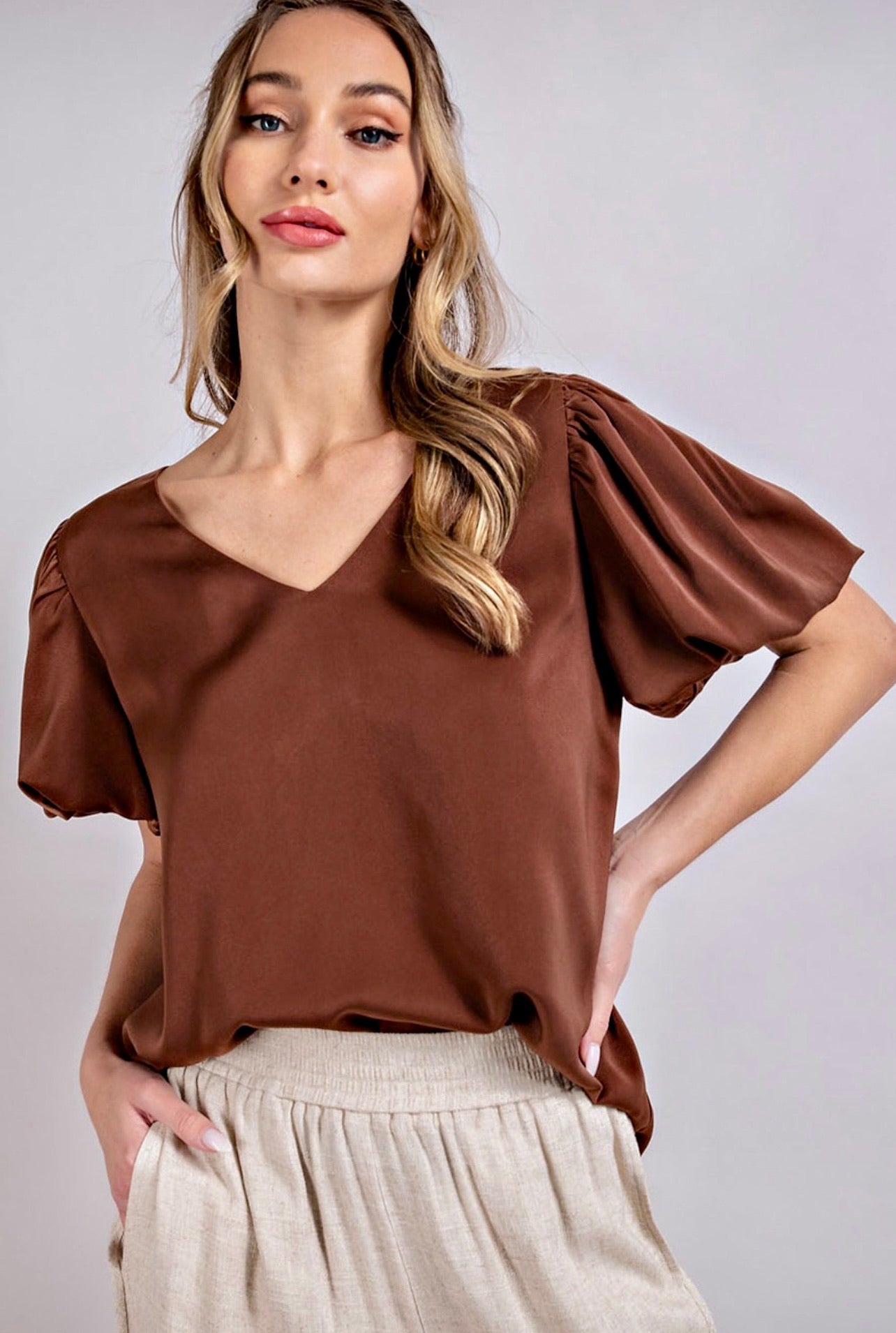 V-Neck Puff Sleeve Blouse - Elegant and stylish blouse, perfect for versatile and chic fashion ensembles.