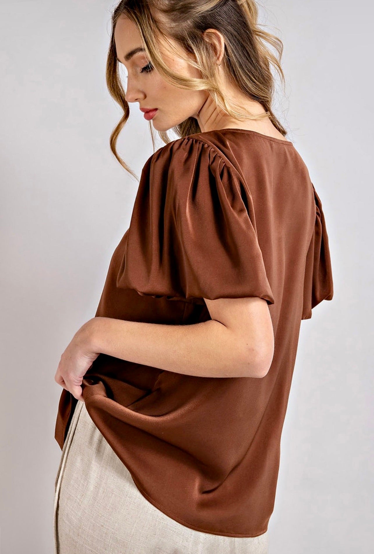 V-Neck Puff Sleeve Blouse - Elegant and stylish blouse, perfect for versatile and chic fashion ensembles.