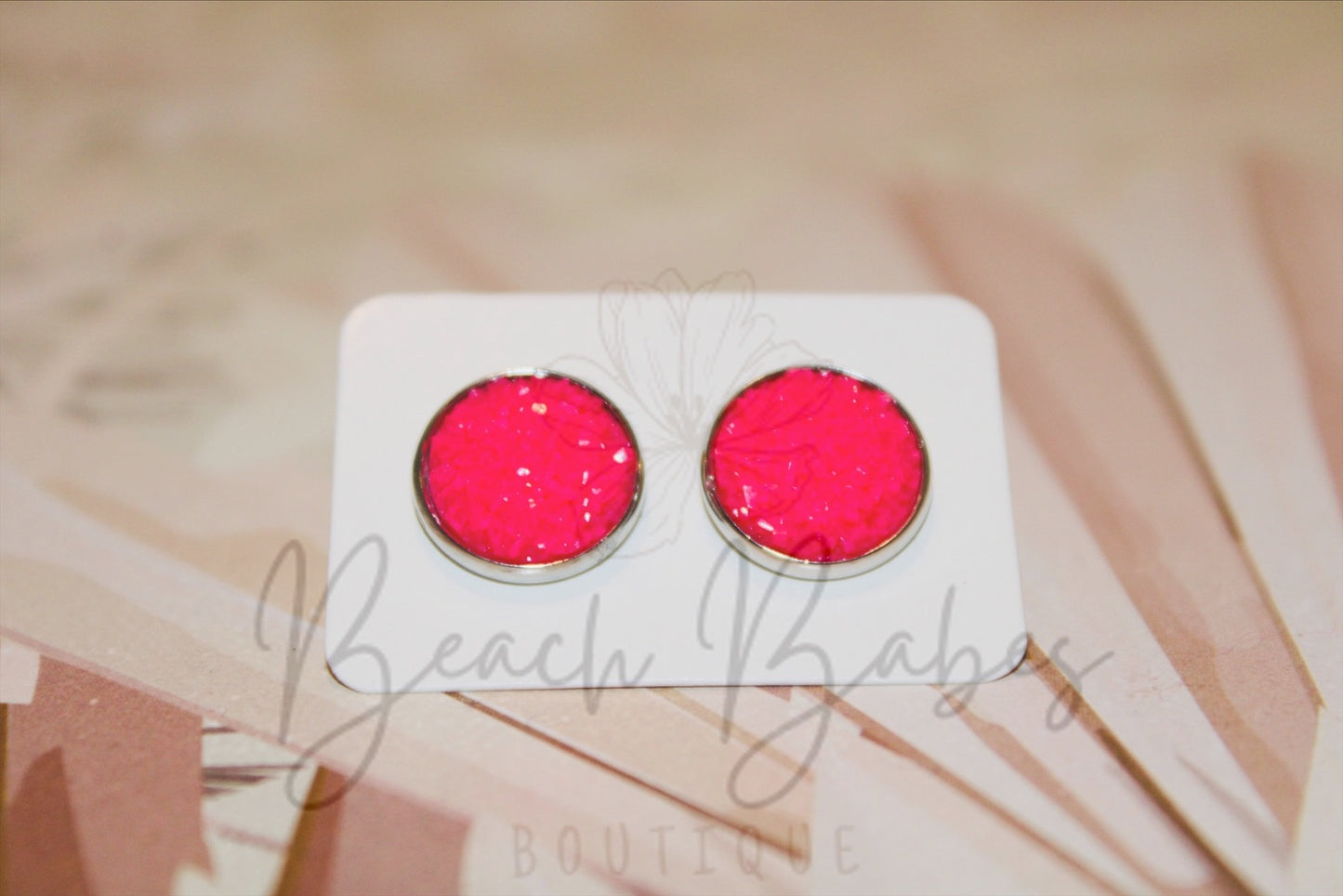 Hot Pink Stud Earrings – Vibrant and chic earrings, perfect for adding a bold touch of color and glamour to any look.