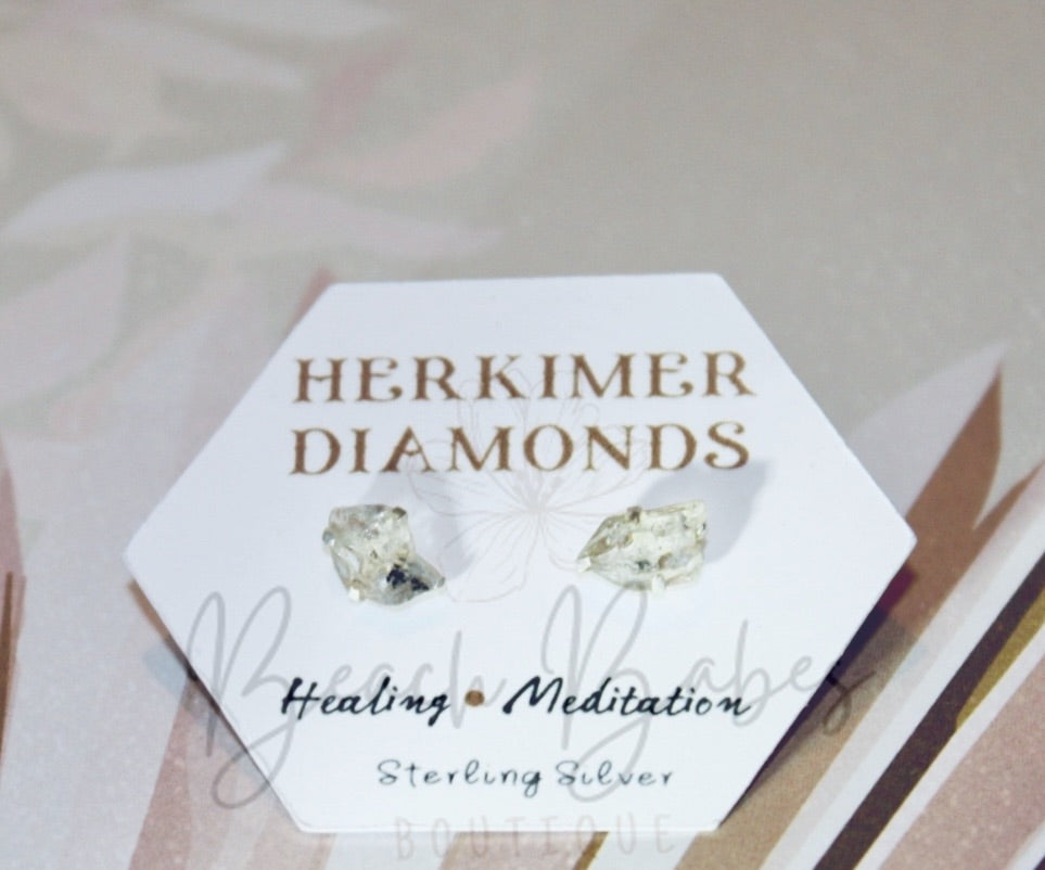 Herkimer Diamond gemstone studs in sterling silver setting, showcasing exquisite craftsmanship and timeless elegance.