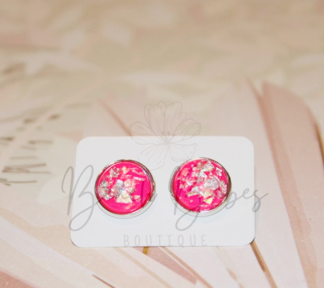 Pink Foil Stud Earrings – Glittering pink gems in a chic stud design, adding a touch of glamour and sophistication to your look.